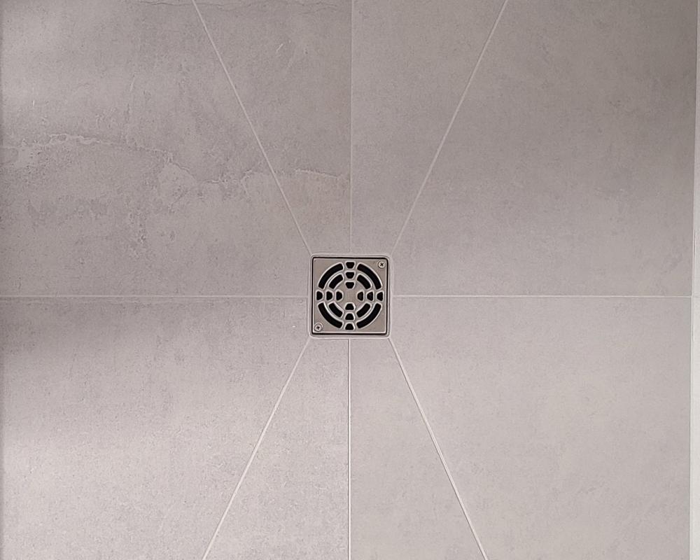 Custom Tile Work For Bathroom Drain Flooring