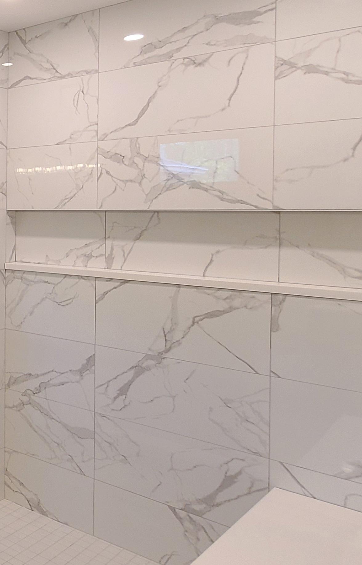 Large Marble Bathroom With Custom Niche